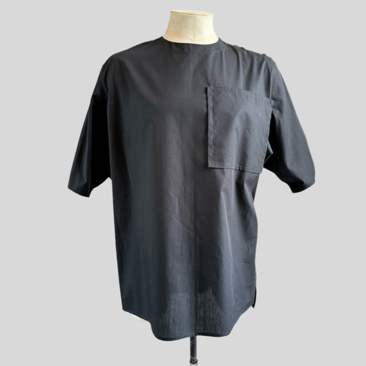 Black Aries Button T-Shirt — front view on mannequin