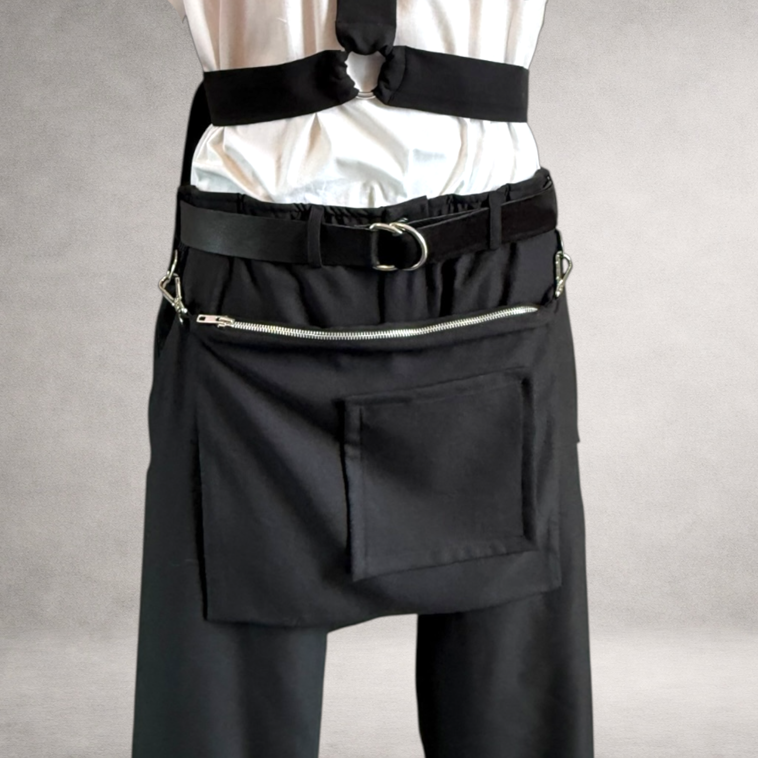 PINTO HERVIA Frame Pouch worn at the waist in black wool with silver zip and detachable clip hardware.