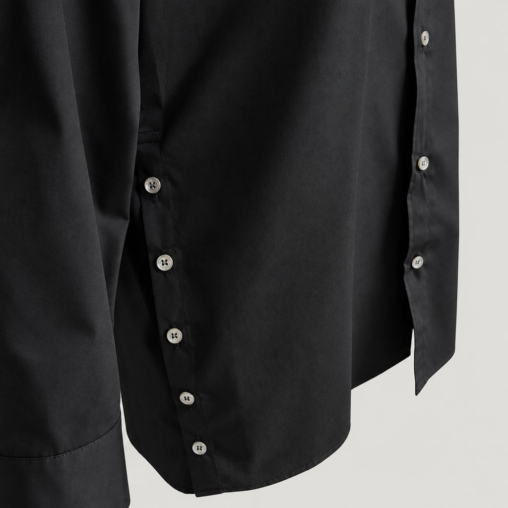 Black Aries 6 shirt detail showing side button fastening