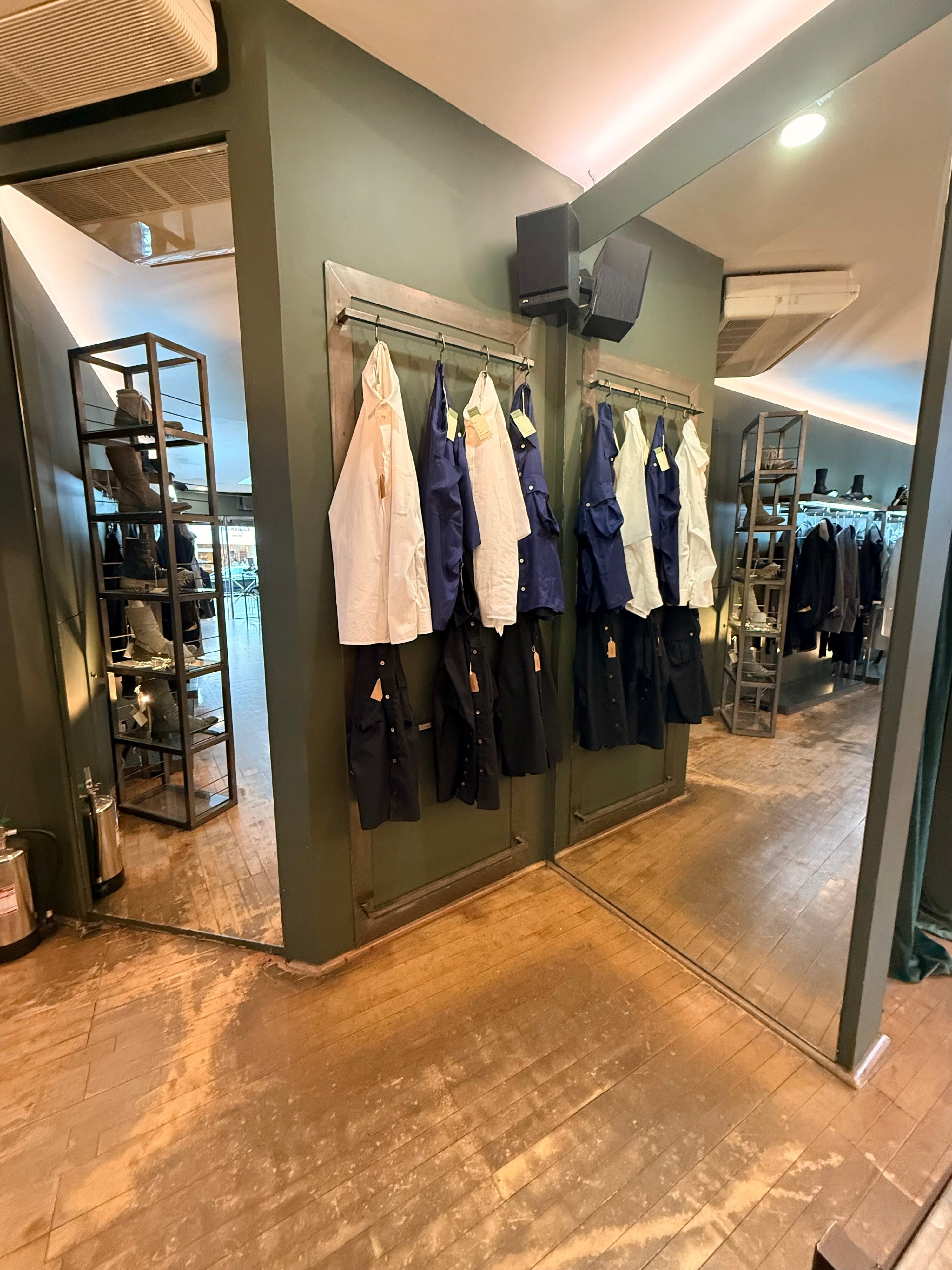 Pinto Hervia Collection of Shirts Hanging at The Library 1994 Store