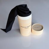 Navy poplin Arrombo Scarf presented with branded Pinto Hervia London packaging tube