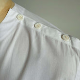 White Aries Button T-Shirt — shoulder button detail
