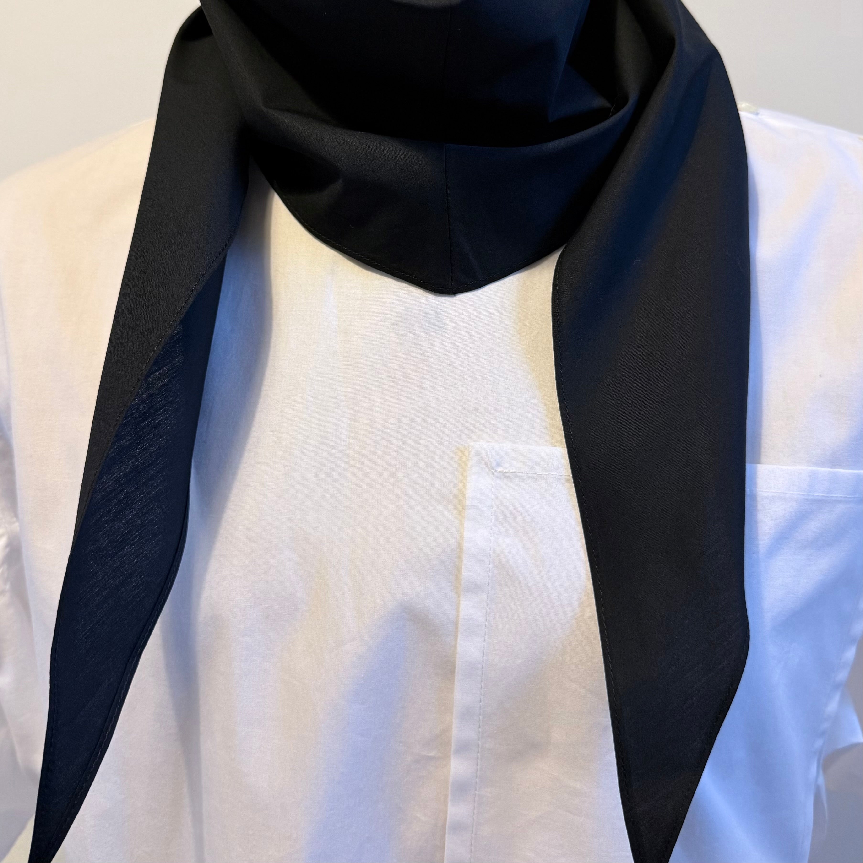 Black cotton poplin bias-cut scarf styled on model as a refined cravat fold – Arrombo Scarf