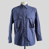 Blue Aries Slouch Pocket shirt — front view on mannequin
