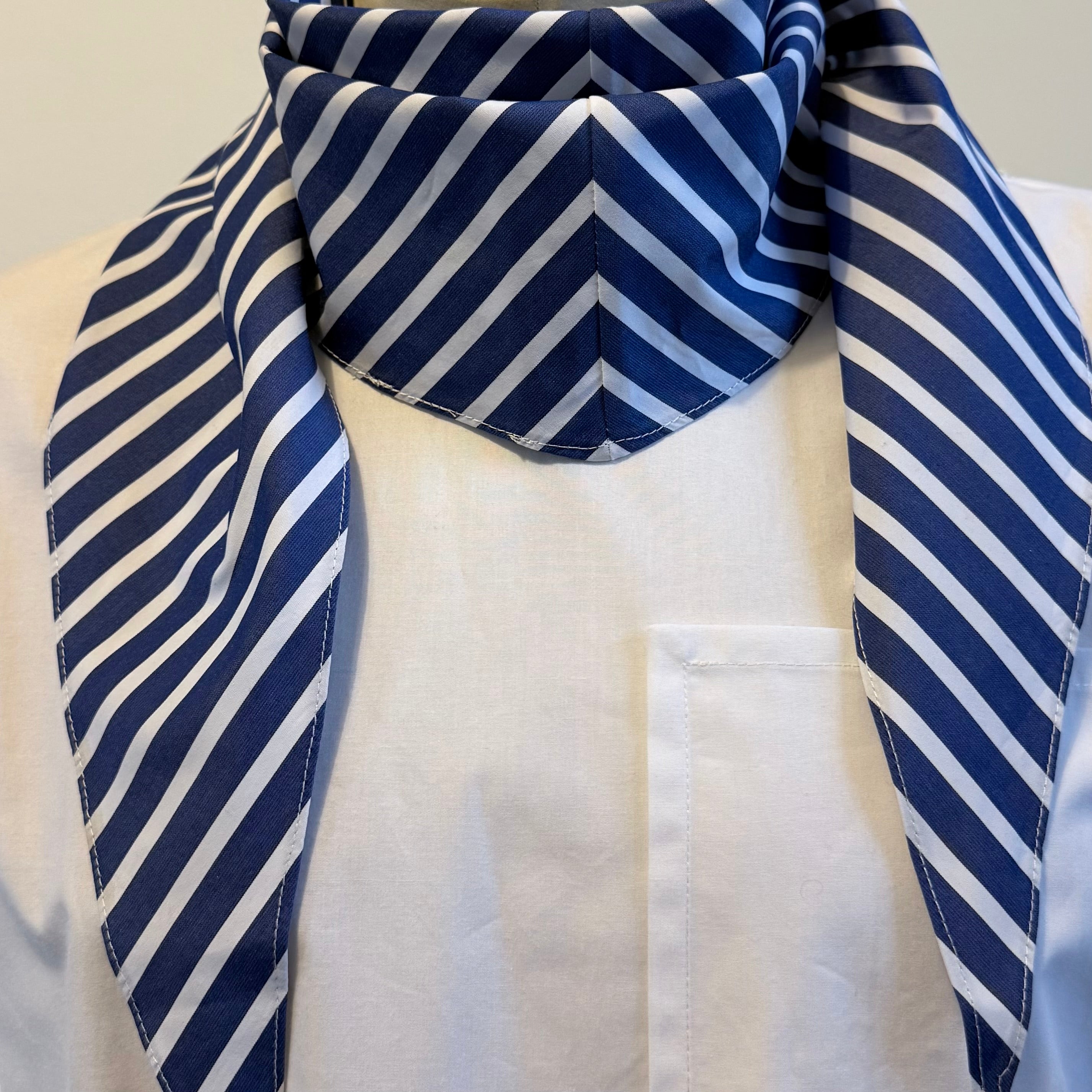 Blue striped cotton poplin bias-cut scarf styled on model in folded cravat style – Arrombo Scarf