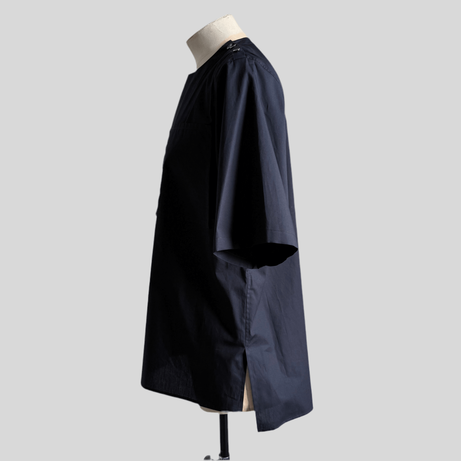 Black Aries Button T-Shirt — sleeve and shoulder detail
