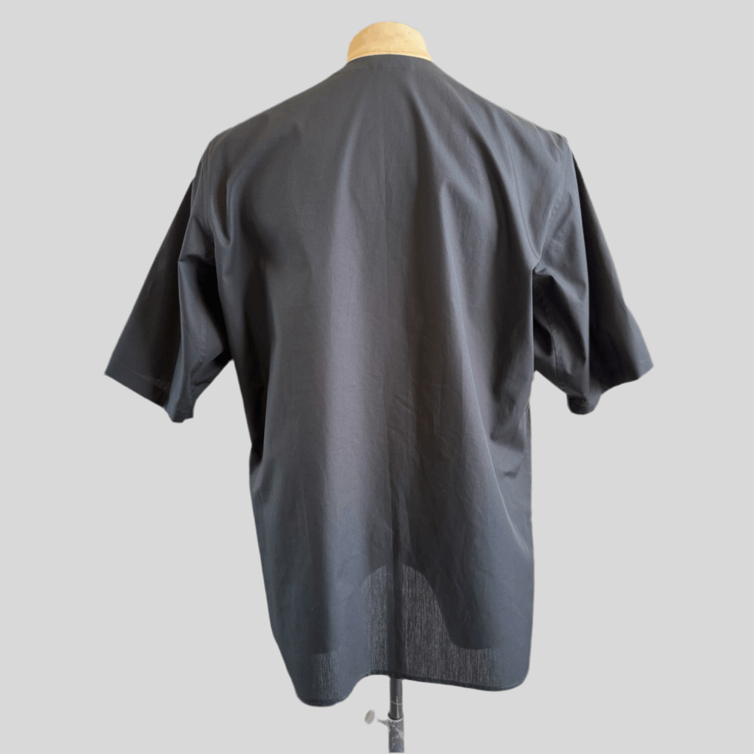 Black Aries Button T-Shirt — back view on mannequin
