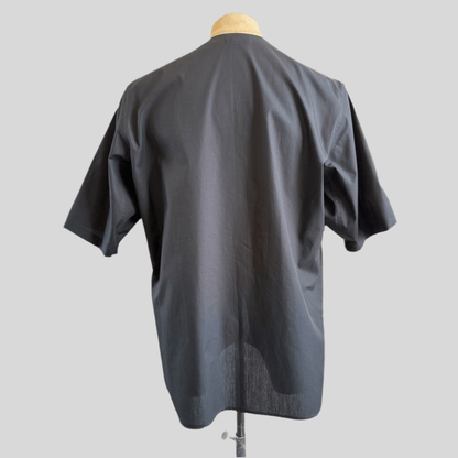 Black Aries Button T-Shirt — back view on mannequin
