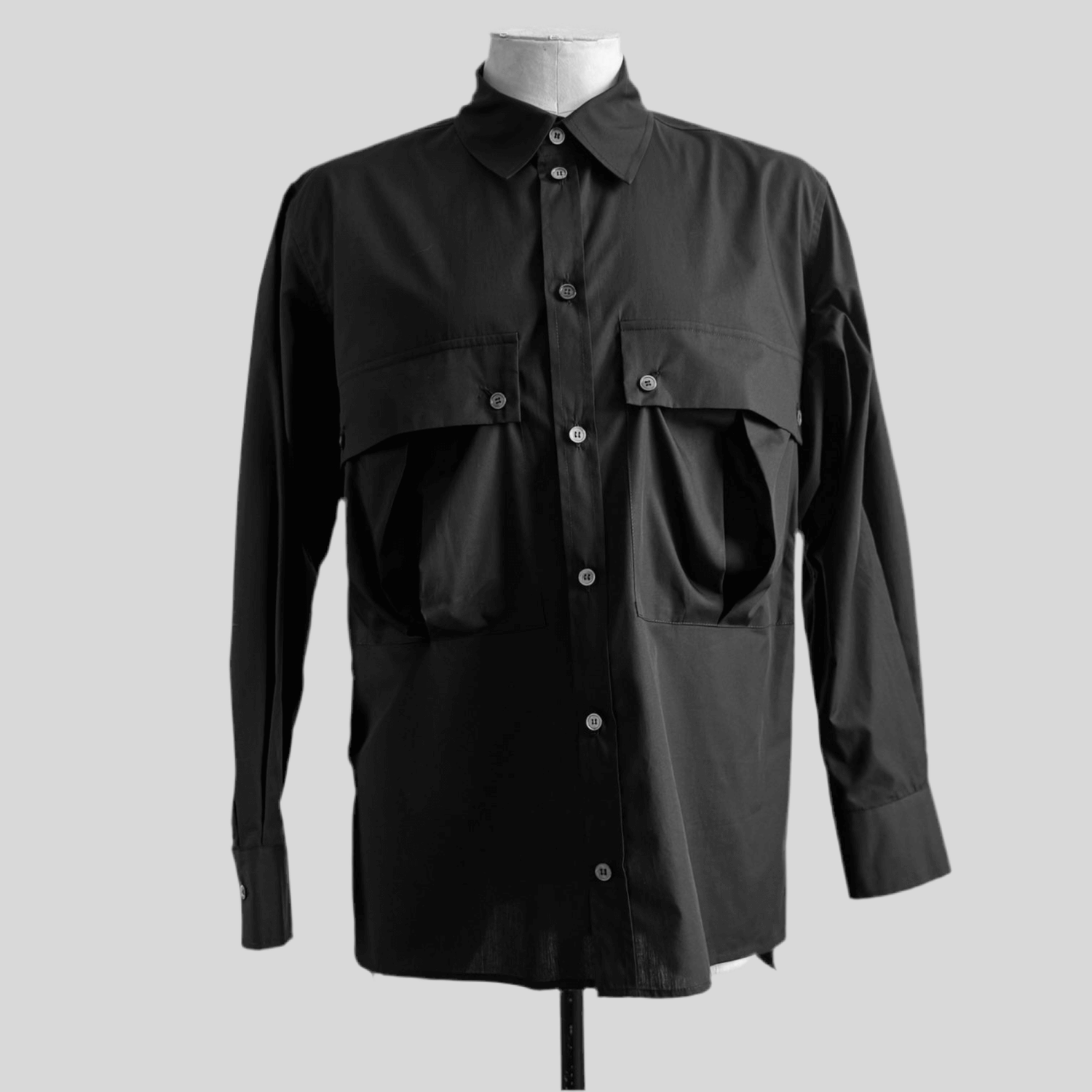Black Aries Slouch Pocket shirt — front view on mannequin
