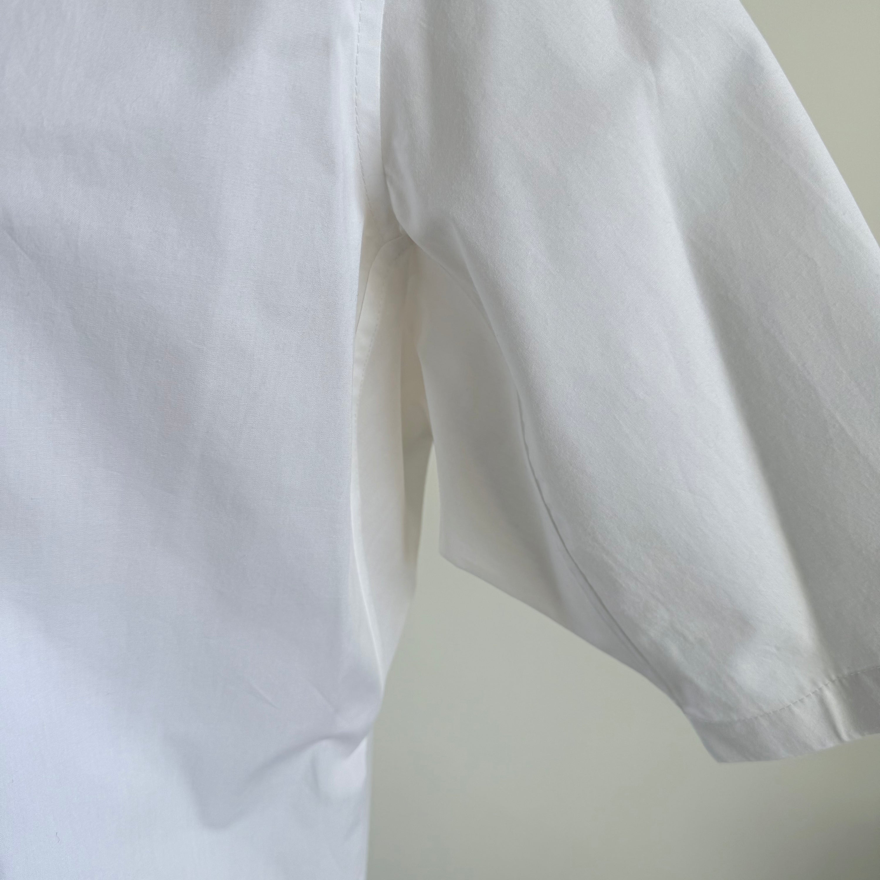 White Aries SS Poplin Shirt — sleeve and side detail
