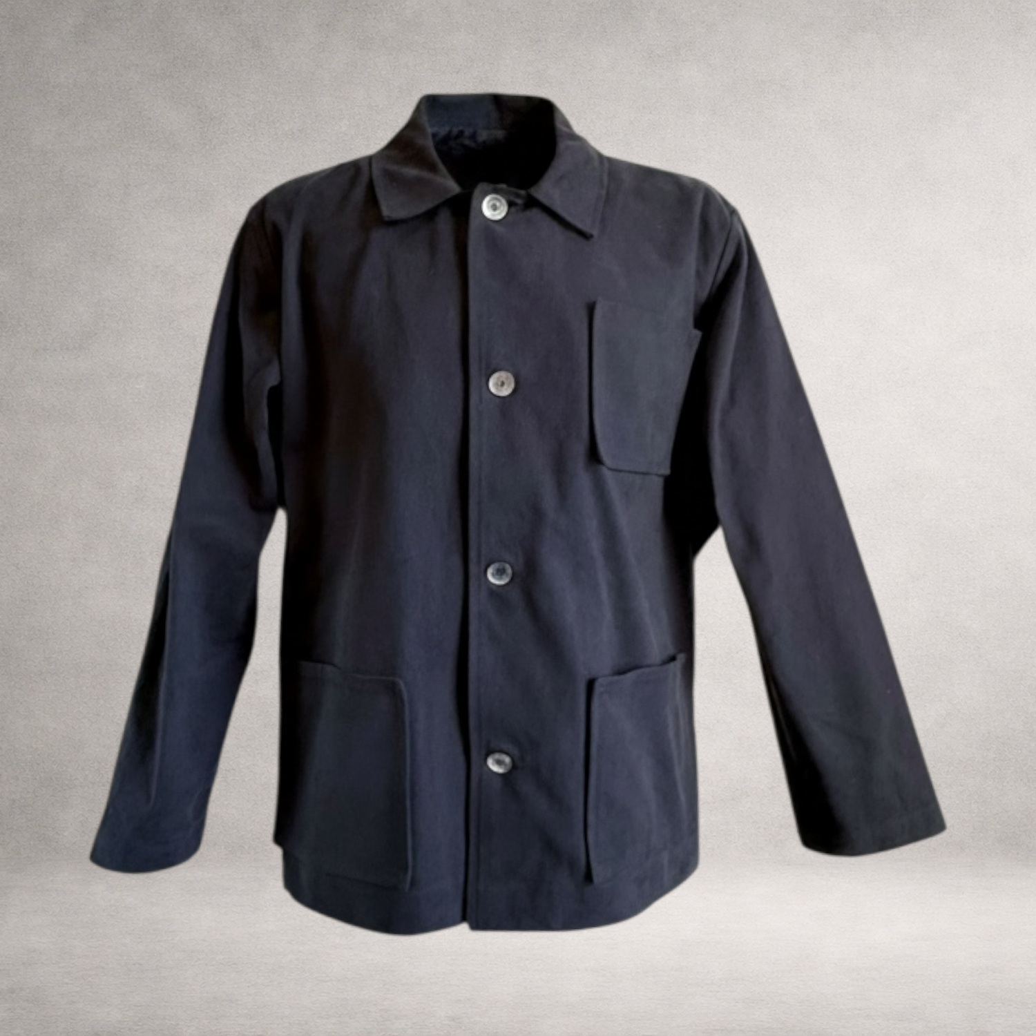 PINTO HERVIA Frame Jacket in black cotton drill with relaxed silhouette, patch pockets and square hem.
