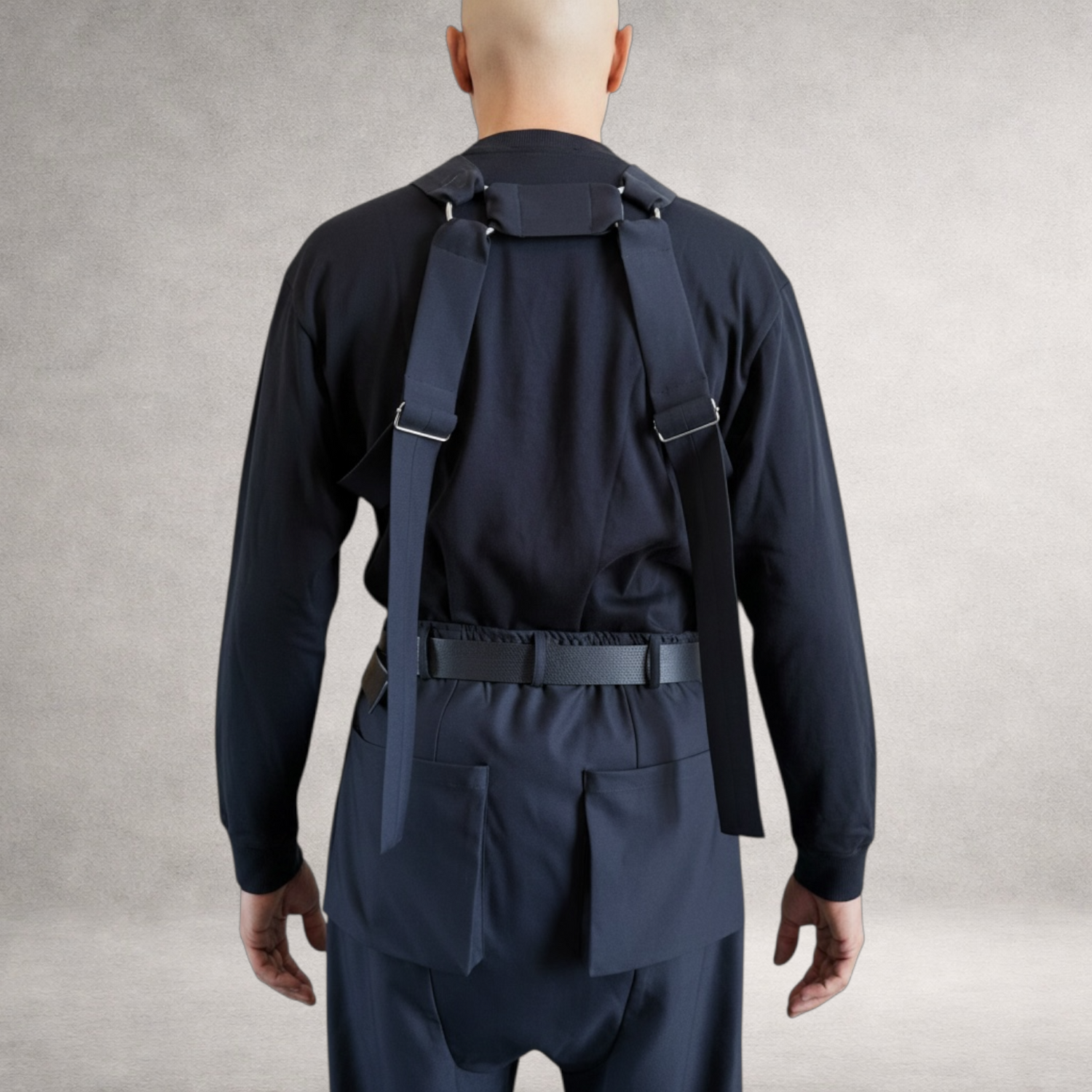Black PINTO HERVIA H-Frame harness with soft structured cotton panels and metal ring hardware. Back view.
