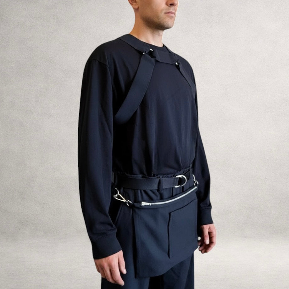 Black PINTO HERVIA H-Frame harness with soft structured cotton panels and metal ring hardware. Front view.