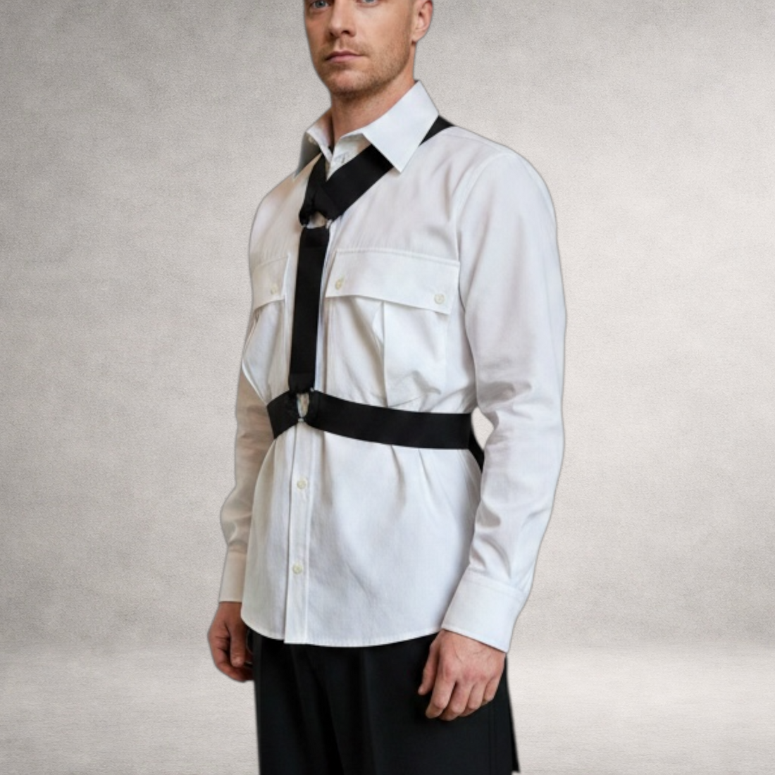 Black PINTO HERVIA Y-Vector harness with soft construction and polished metal hardware. Worn by male model.