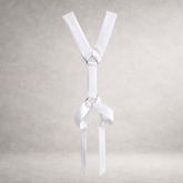 White poplin PINTO HERVIA Y-Vector harness with soft structured construction and polished metal hardware.