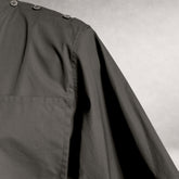 Black  Aries 4 shirt detail showing shoulder button construction