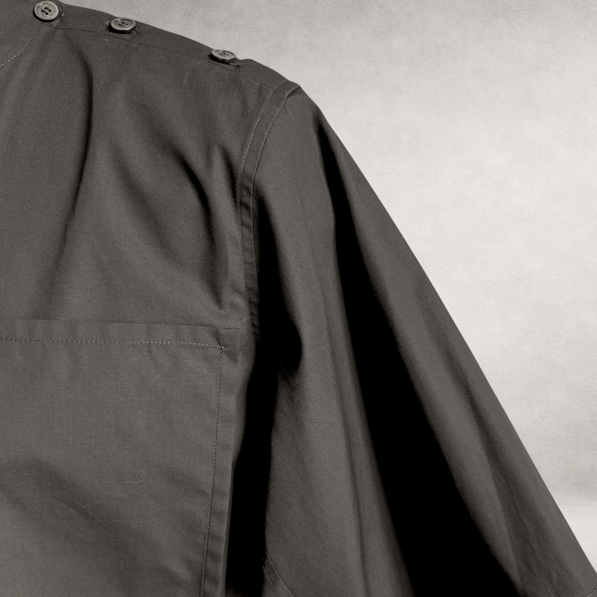 Black  Aries 4 shirt detail showing shoulder button construction