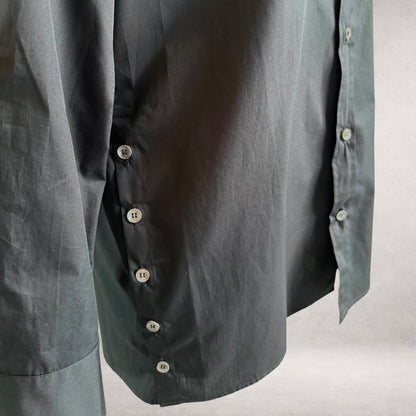 Black Aries 6 shirt detail showing side button fastening