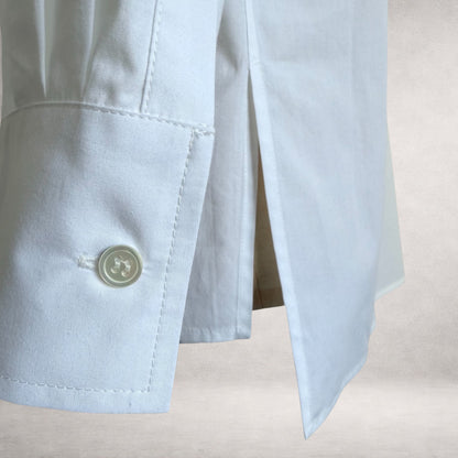 White Aries  long sleeve shirt detail showing construction and finish of hem