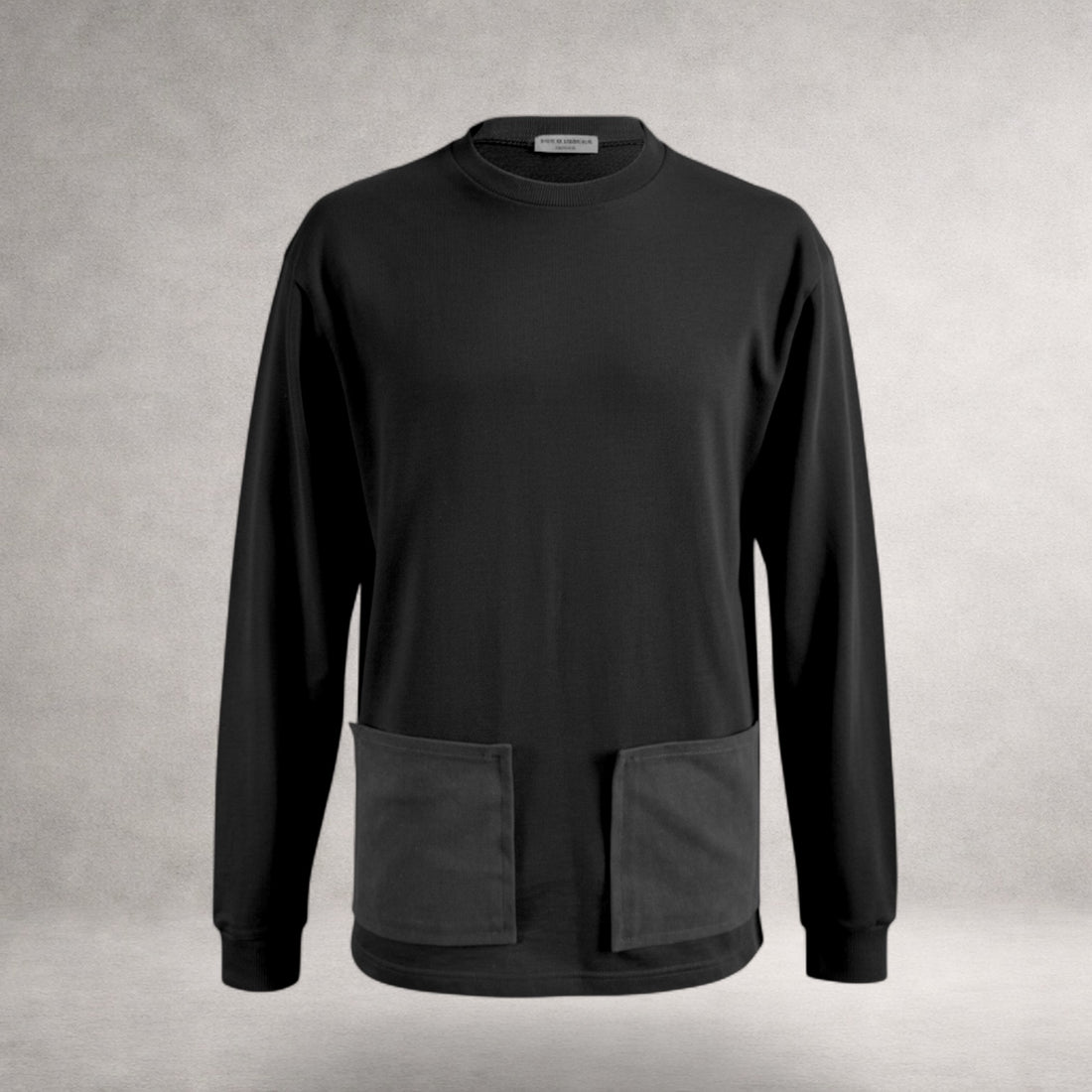 Black Atlas long sleeve jersey top with front patch pockets and extended back hem made in England
