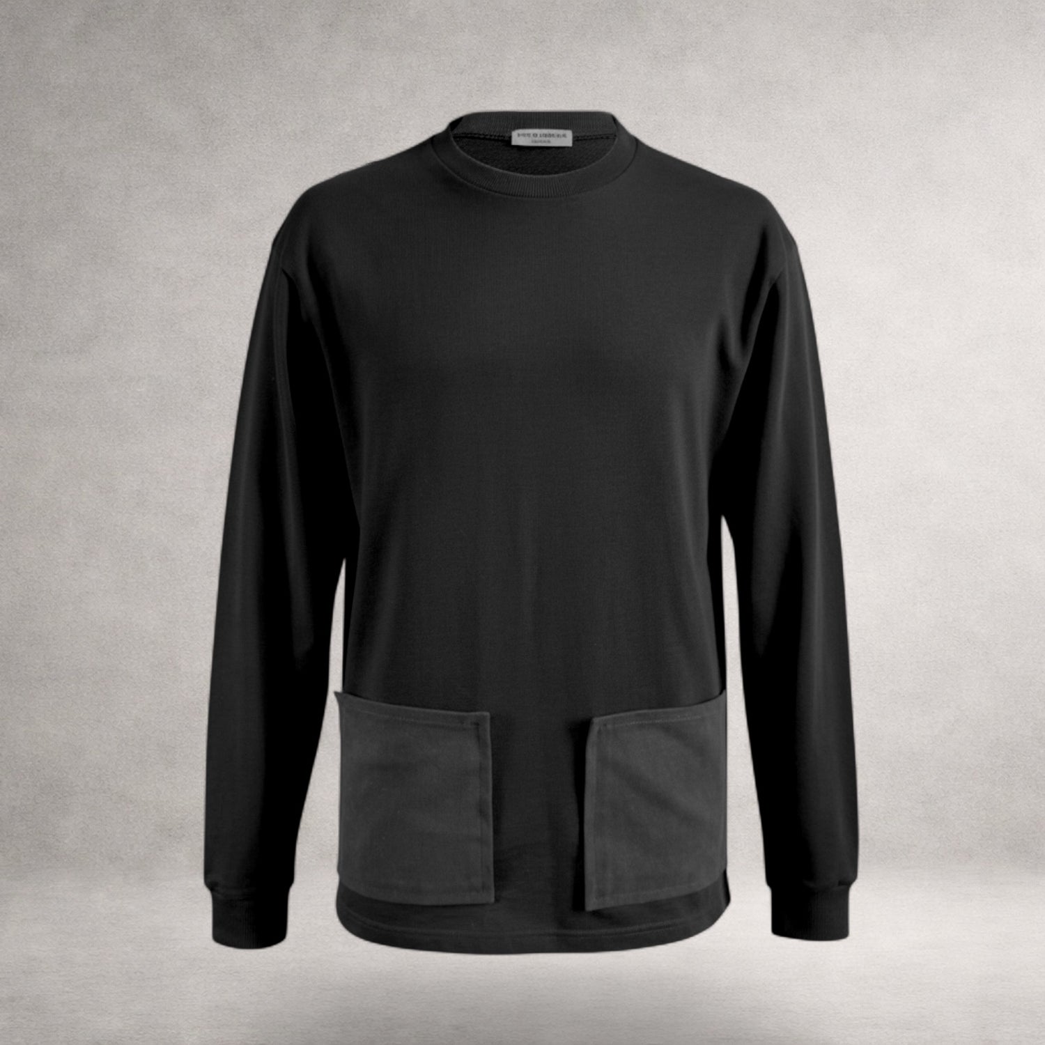 Black Atlas long sleeve jersey top with front patch pockets and extended back hem made in England
